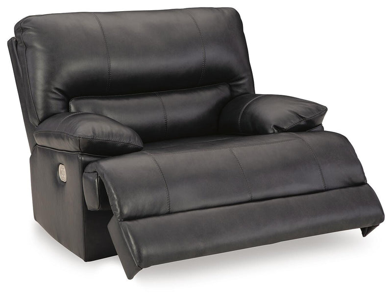 Ashley Furniture Mountainous Living Room Set featuring a sofa, armchair, and coffee table in a spacious, modern design.