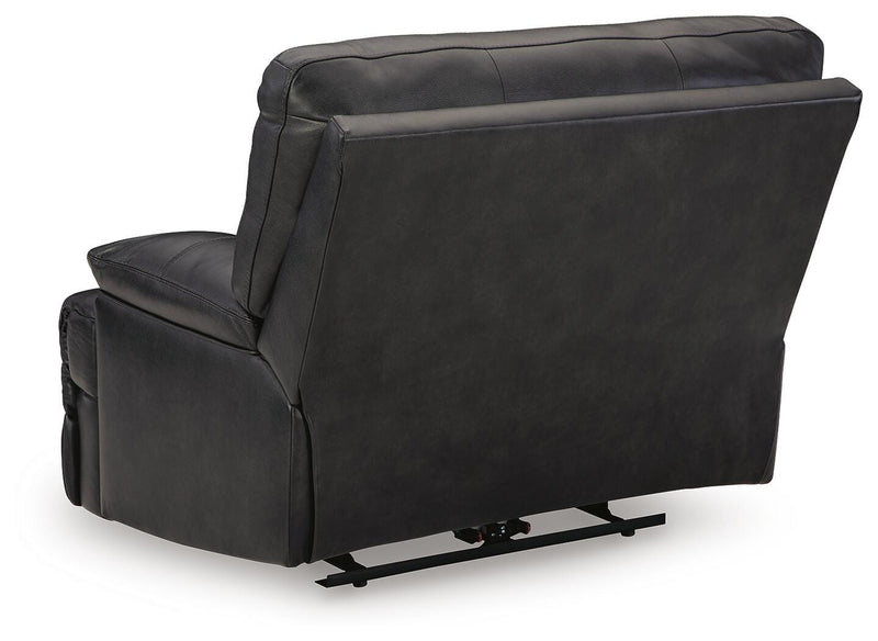 Ashley Furniture Mountainous Living Room Set featuring a sectional sofa with plush cushions and a modern design.