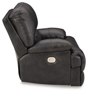Ashley Furniture Mountainous Living Room Set featuring a sofa and loveseat with plush cushions and a modern design.