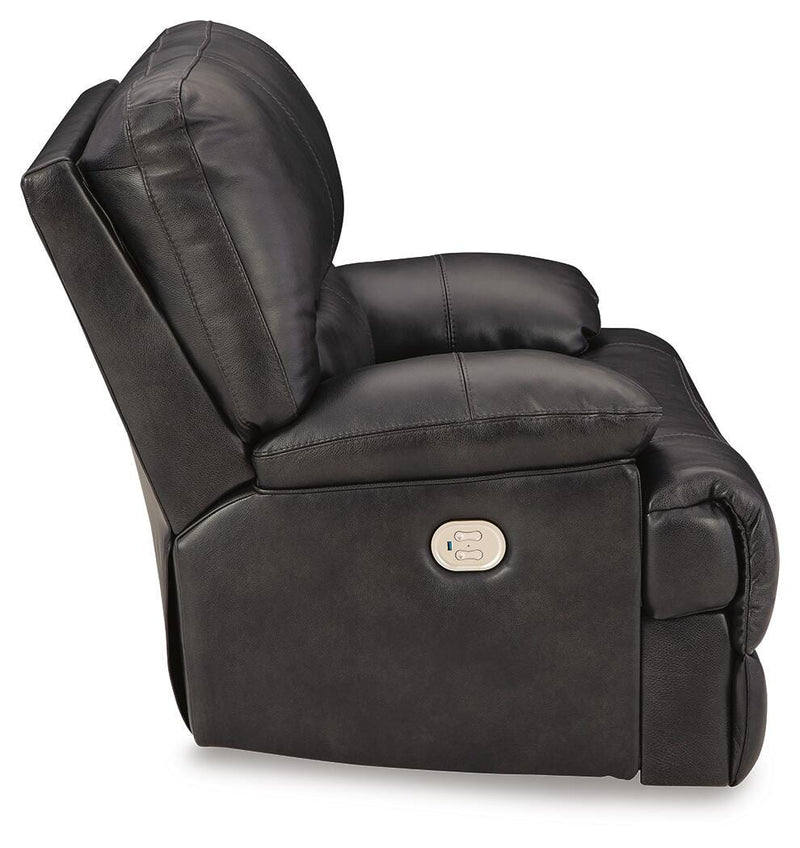 Ashley Furniture Mountainous Living Room Set featuring a sofa and loveseat with plush cushions and a modern design.