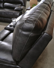 Ashley Furniture Mountainous Living Room Set featuring a sectional sofa with plush cushions and a modern design.