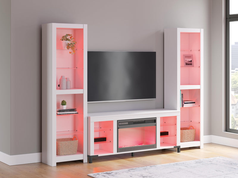 Ashley Furniture Brollevi Entertainment Center with multiple shelves and compartments in a rich wood finish.