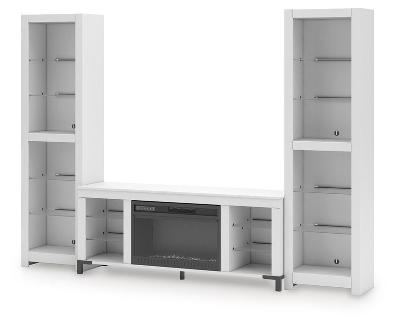 Ashley Furniture Brollevi entertainment center with open shelving and storage compartments, shown from an angled view.