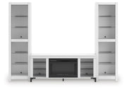 Ashley Furniture Brollevi Entertainment Center with open shelves and storage compartments, modern wood finish.