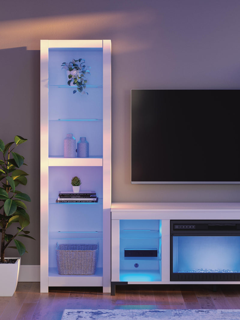 Ashley Furniture Brollevi Entertainment Center with open shelves and storage compartments, dark wood finish, modern design.