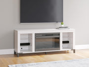 Ashley Furniture Brollevi 60-inch TV stand with electric fireplace, modern entertainment center with storage and warm lighting.