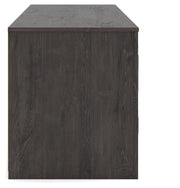 Ashley Furniture Cayboni 71-inch TV stand with built-in electric fireplace, featuring a modern wood finish and open shelving.