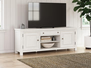 Ashley Furniture Robbinsdale 72-inch TV stand with wood finish, multiple storage drawers, and open shelving for entertainment devices