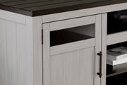 Ashley Furniture Darborn 88-inch TV stand with open shelves and storage cabinets, made of wood with a warm finish.