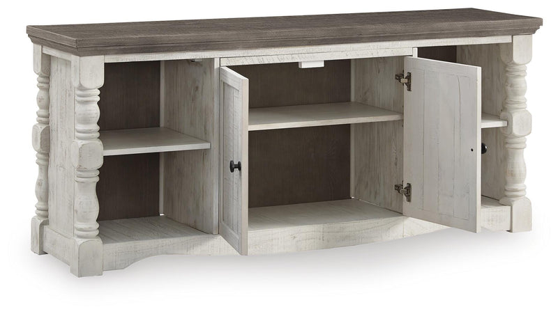 Ashley Furniture Havalance 67-inch TV stand with open shelving and a modern design, shown from an angled view.