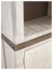 Ashley Furniture Havalance left pier cabinet with detailed wood finish and decorative hardware.