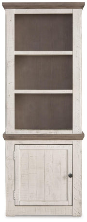 Ashley Furniture Havalance left pier cabinet with wood finish, featuring decorative hardware and storage compartments.