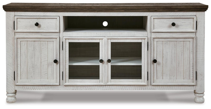 Ashley Furniture Havalance TV stand with open shelves and storage compartments, shown from a front head-on view.