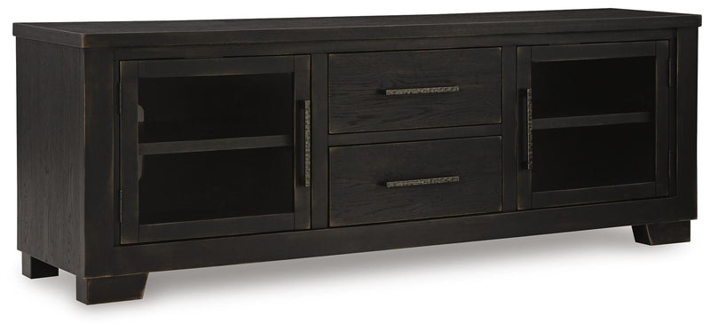 Ashley Furniture Galliden 80-inch TV stand with closed storage and open shelving, shown from an angled view.