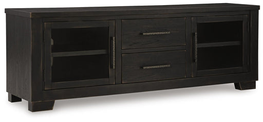 Ashley Furniture Galliden 80-inch TV stand with closed storage and open shelving, shown from an angled view.