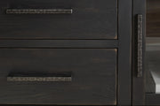 Detail view of the Ashley Furniture Galliden 80-inch TV stand showcasing its wood finish and spacious storage compartments.