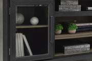 Ashley Furniture Foyland 83-inch TV stand with wood finish, featuring open shelves and storage cabinets.
