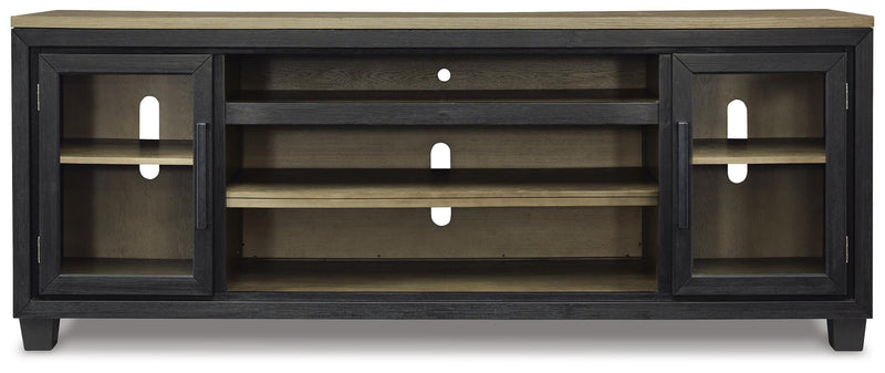Ashley Furniture Foyland 83-inch TV stand with spacious shelves and a rich wood finish, designed for modern living room setups.